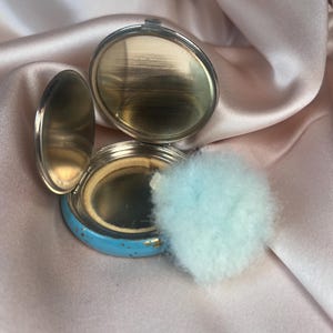 1920s Vintage Powder compact with matching swansdown Puff! Sky blue enamel is cheerful and inviting after almost 100 years.