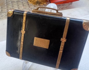 Compacto vintage. Raro, coleccionable. Compacto de polvos y rubor HingeCo Suitcase. Kitch de los años 50.