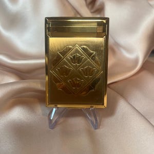 Vintage Mid-Century Richard Hudnut vintage compact. Iconic floral design Pristine condition. Powder, Blush and Lipstick.