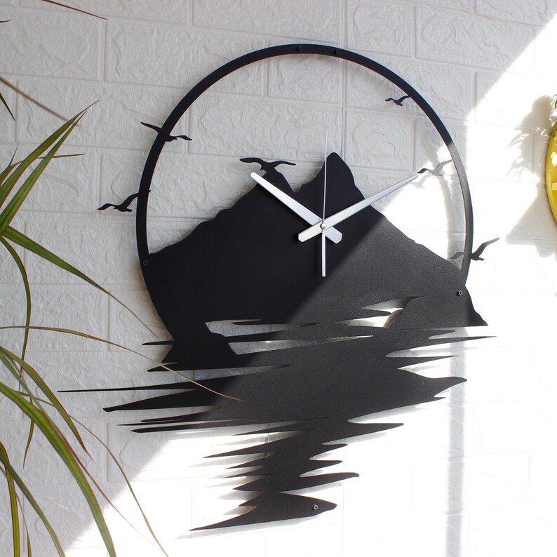 Nature wall art clock displayed above console table in cozy living room