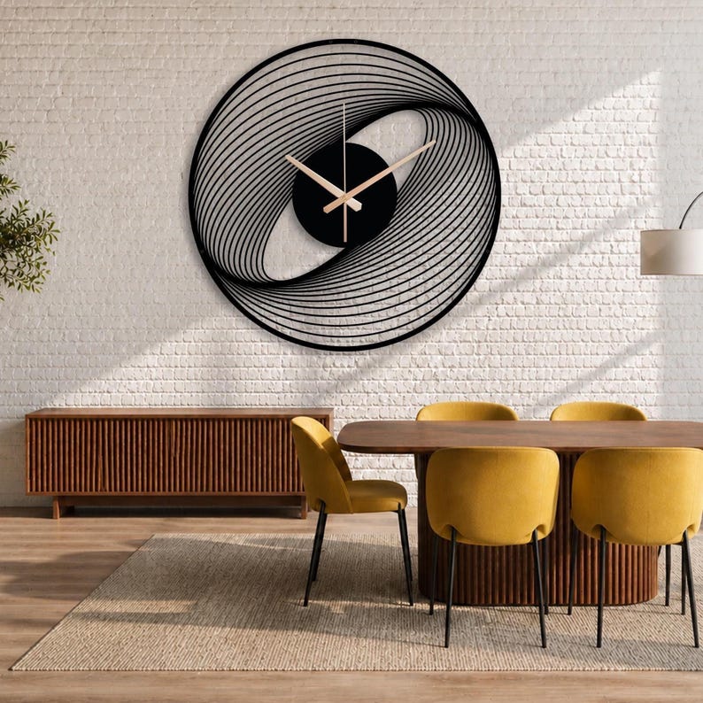 Large spiral metal wall clock with minimalist design and gold hands, modern black silent wall decor for living room