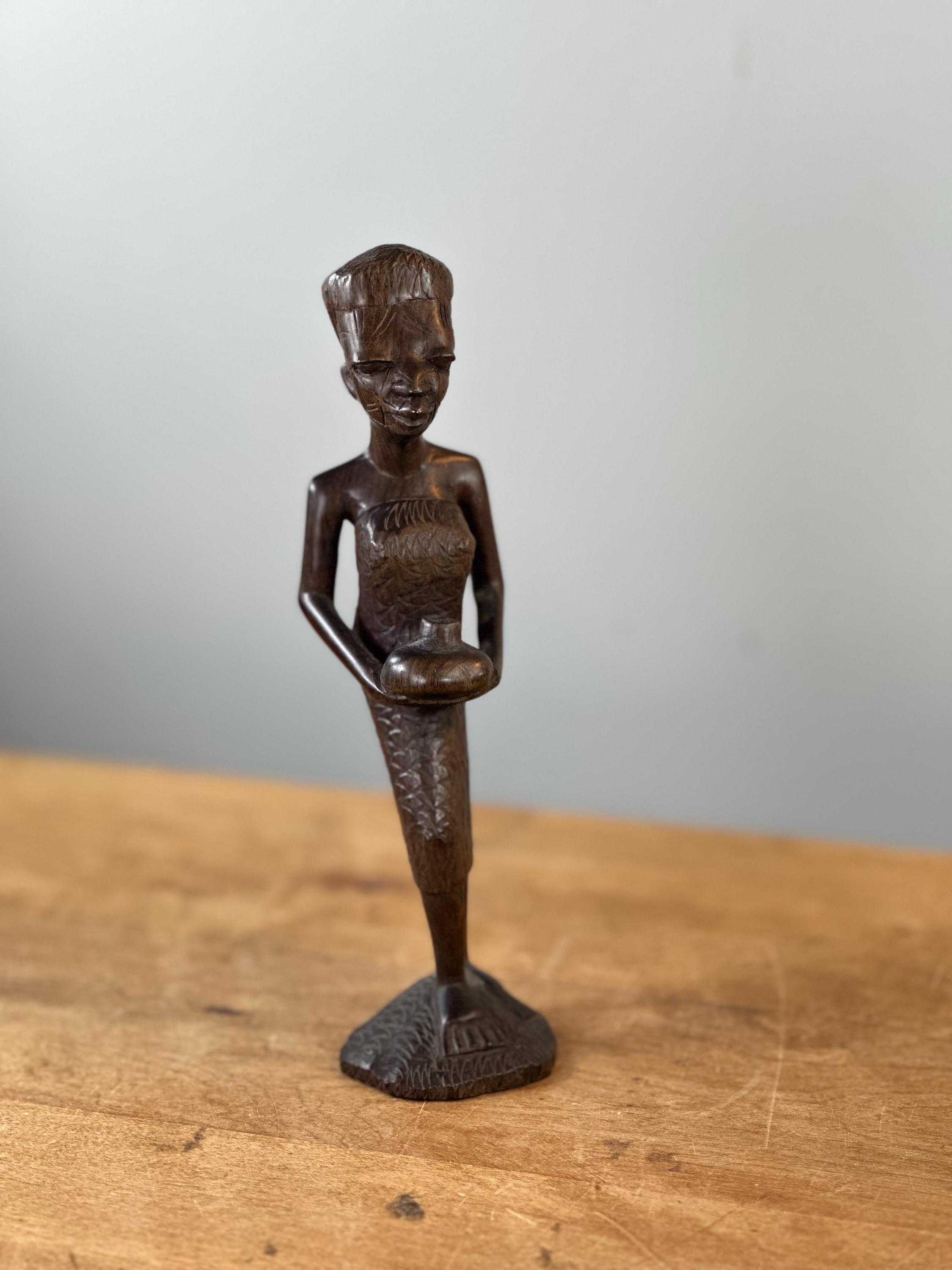 部族の傷跡のあるアフリカの黒檀彫刻像〜ヴィンテージ - Etsy 日本