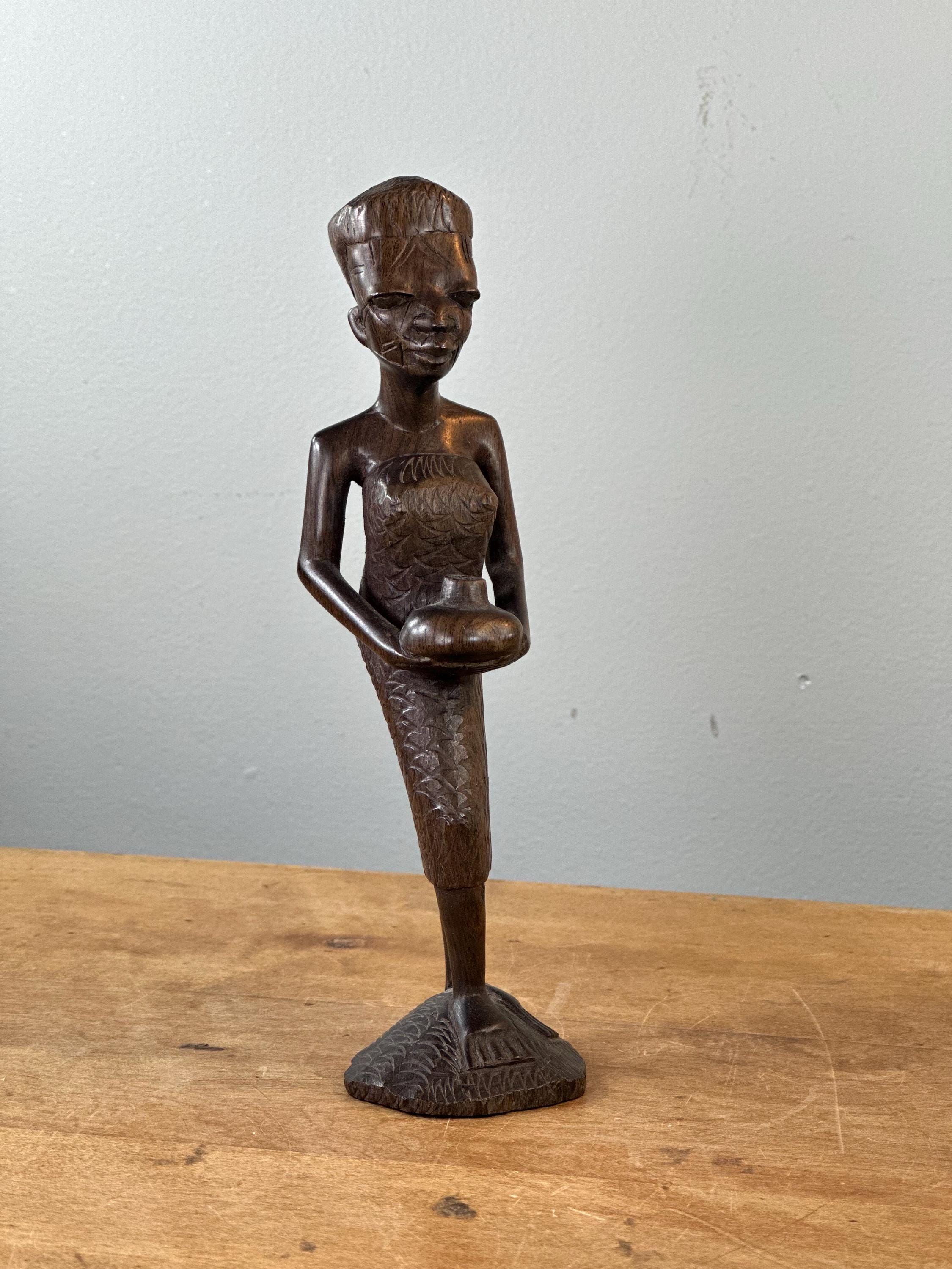 部族の傷跡のあるアフリカの黒檀彫刻像〜ヴィンテージ - Etsy 日本