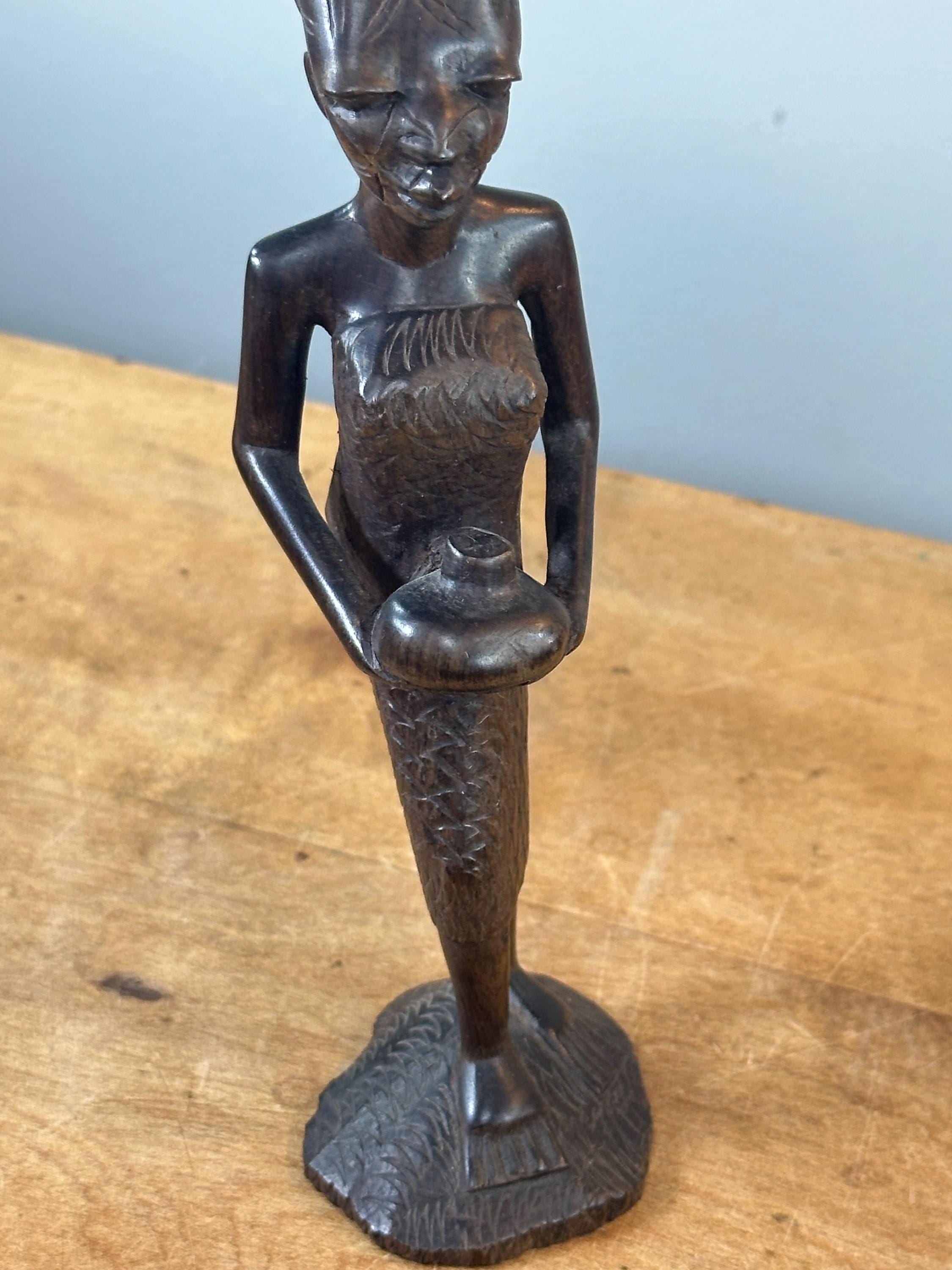 部族の傷跡のあるアフリカの黒檀彫刻像〜ヴィンテージ - Etsy 日本