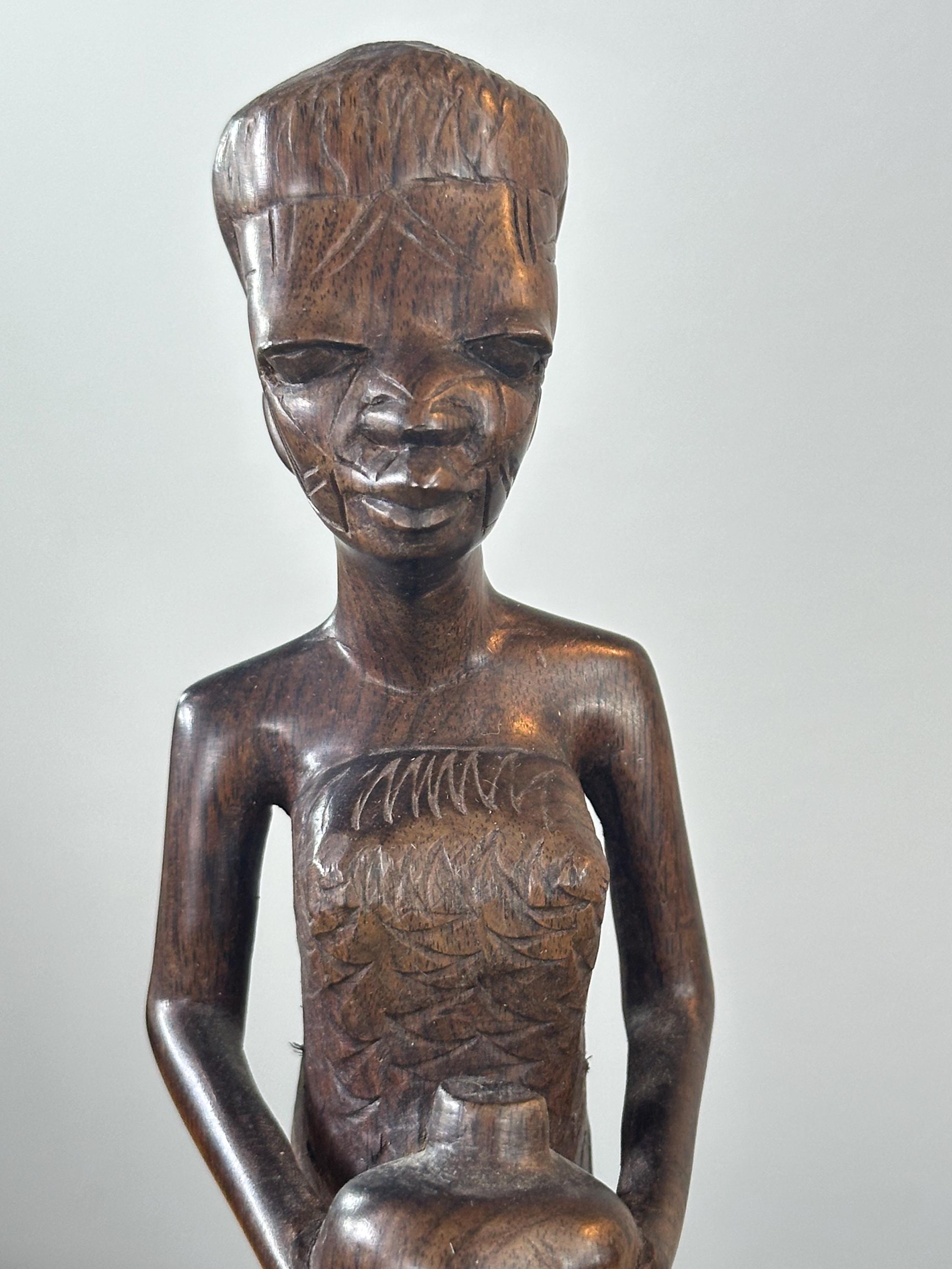 部族の傷跡のあるアフリカの黒檀彫刻像〜ヴィンテージ - Etsy 日本
