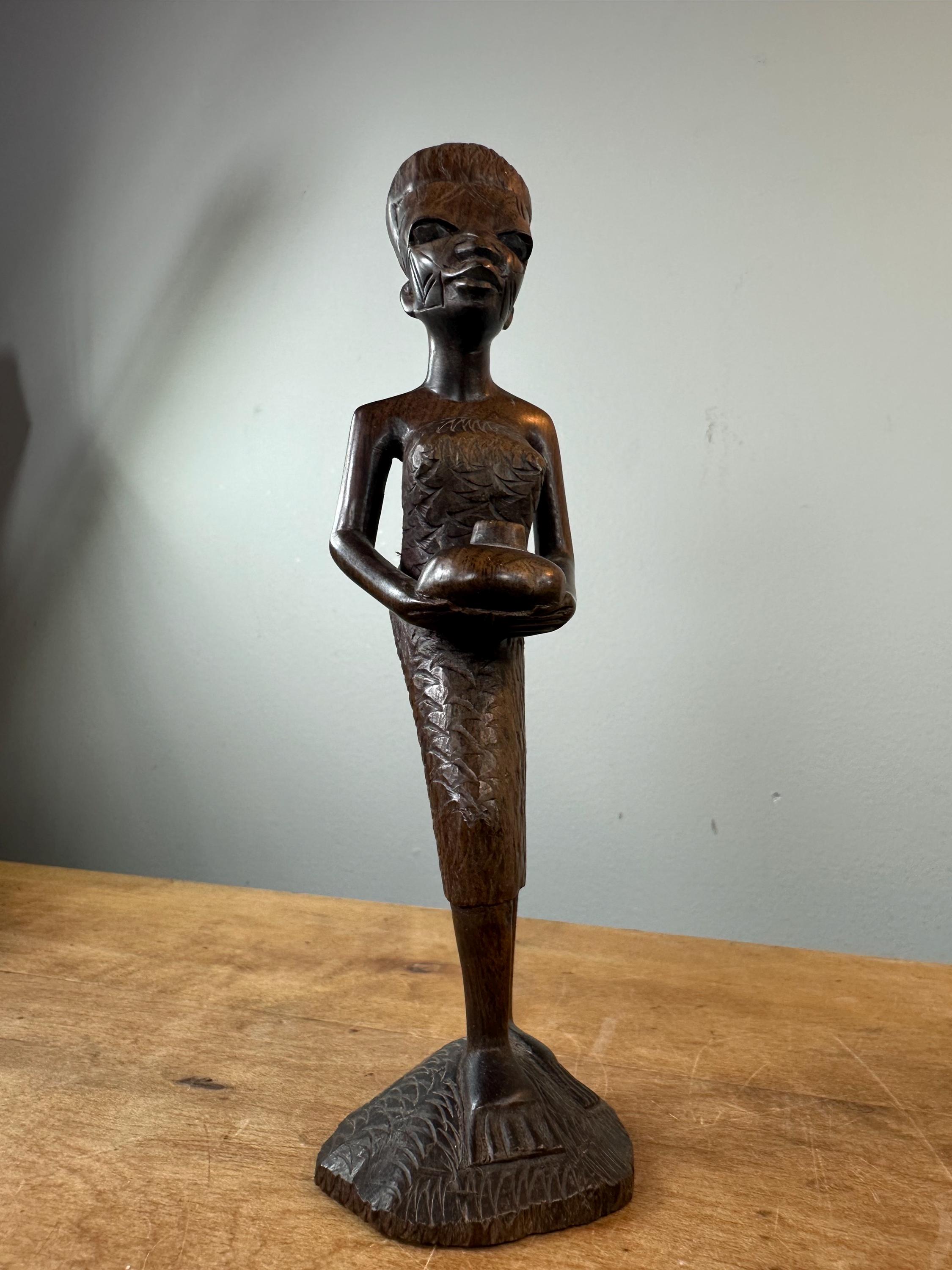 部族の傷跡のあるアフリカの黒檀彫刻像〜ヴィンテージ - Etsy 日本