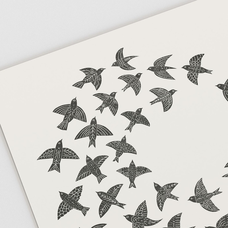 May include: A print featuring a flock of stylized black birds against a cream background. The birds are depicted in various poses, with detailed wing patterns. The artwork has a folk art aesthetic, suitable for wall decor.
