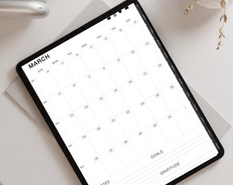 May include: A white tablet with a black border displaying a March calendar with a section for notes, goals, and gratitude.