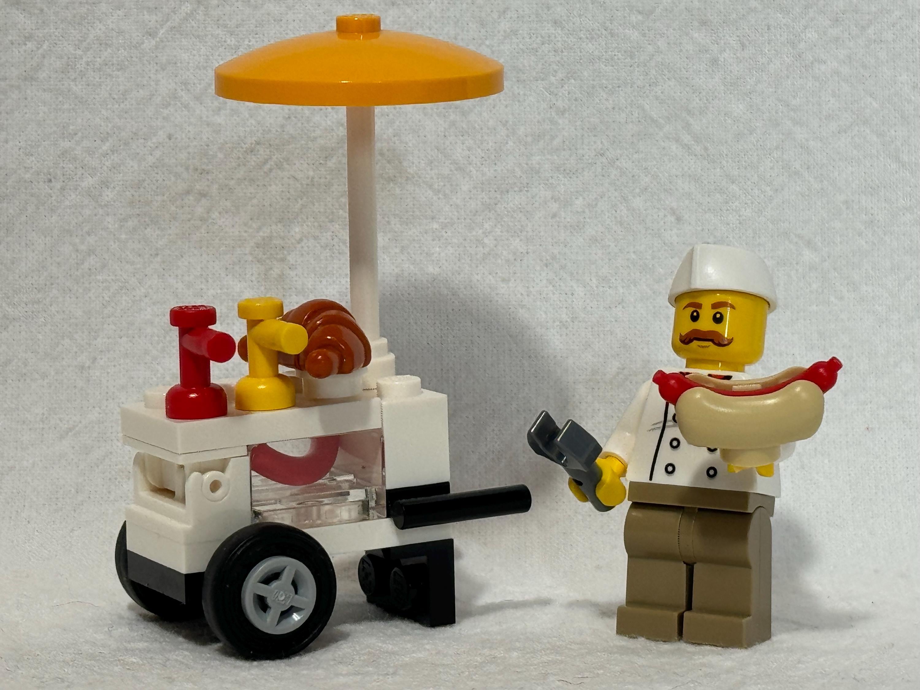 Minifigura de vendedor de perritos calientes Lego con carrito y