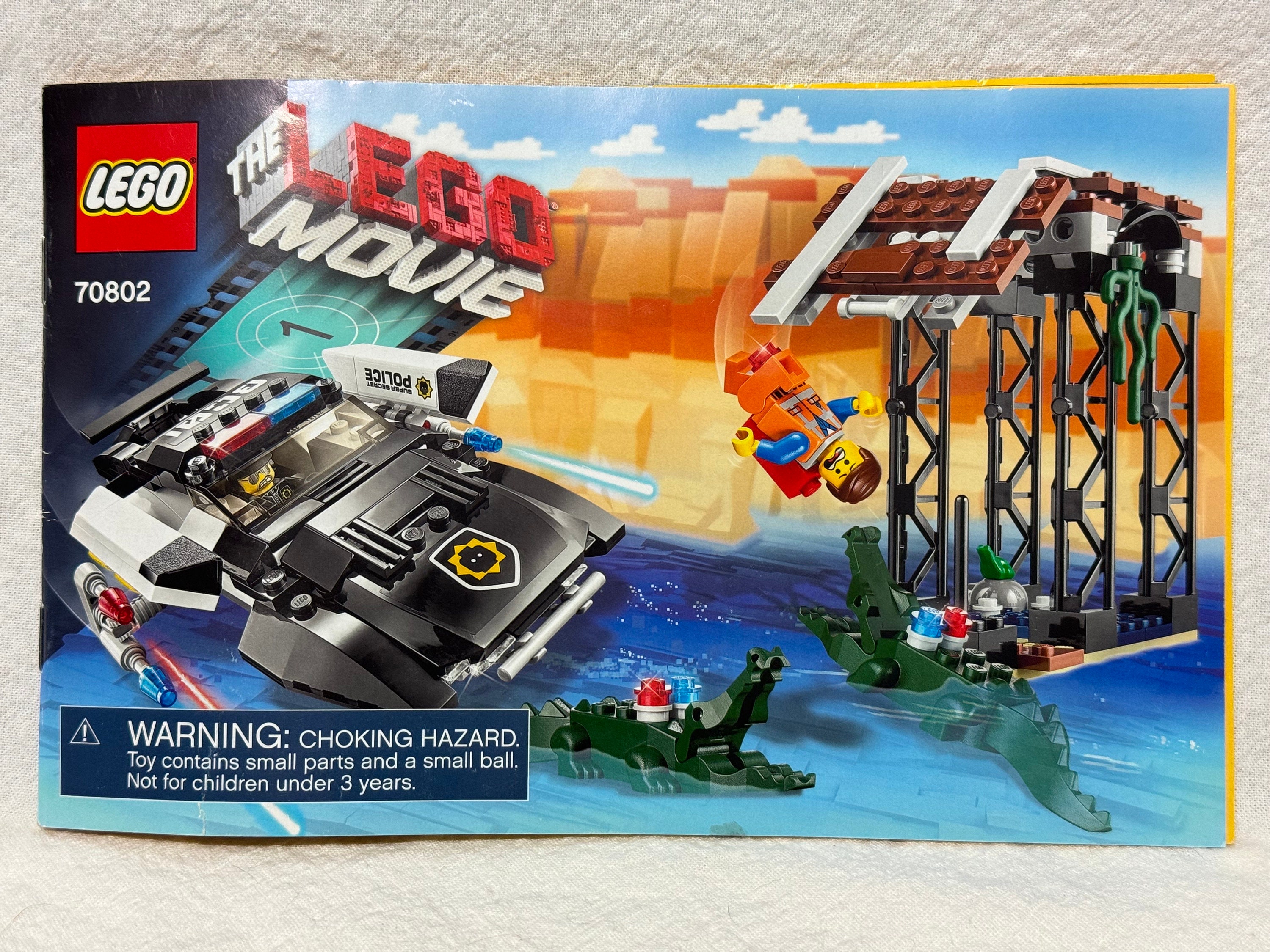 Lego 70802 Bad Cop s Pursuit The Lego Movie Pre Owned 100 Complete 314 Pieces 2 Minifgures Bad Cop Emmet Instructions Retired