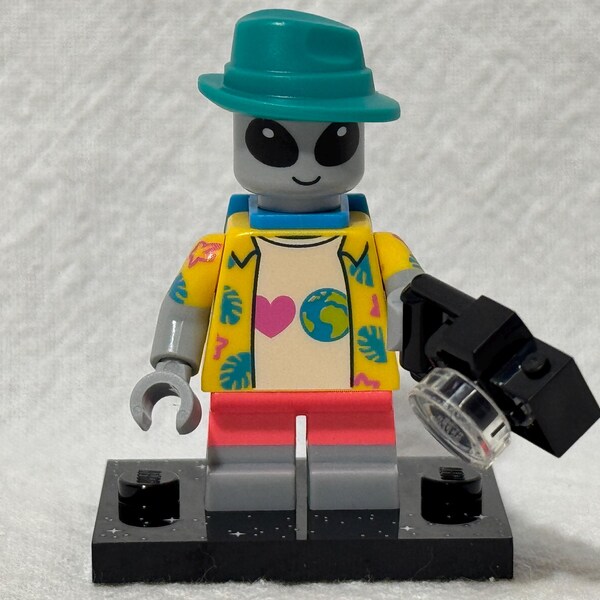Minifigura de turista alienígena Lego CMF Serie 26, incluye soporte para accesorios e instrucciones, retirada 71046-3, en perfecto estado, envío rápido