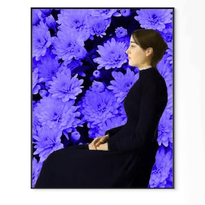 May include: A framed art print featuring a woman in a black dress against a backdrop of vibrant blue flowers. The woman is depicted in profile, with a serene expression. The artwork has a classic, painterly style.