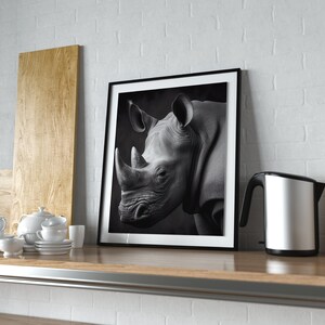 Stunning, black and white, framed portrait of a rhino sitting on a kitchen counter.
