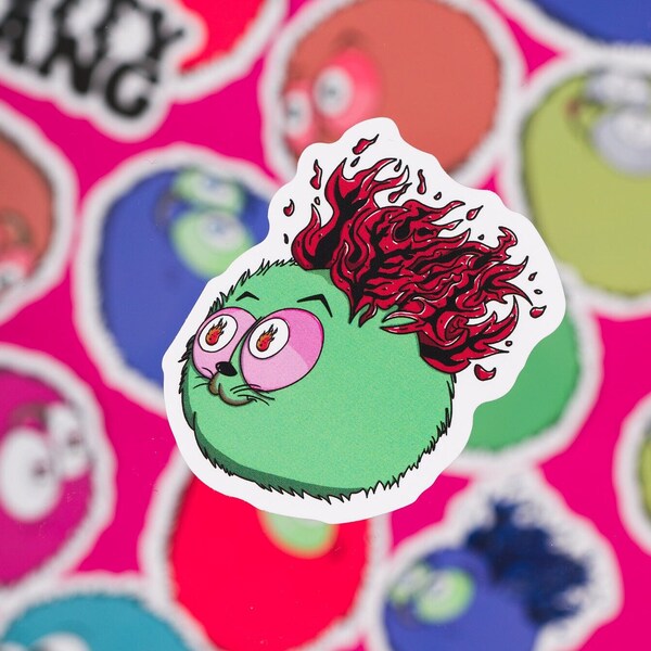 BlazeBuddy - Sticker feuilleté vert avec des yeux de feu joyeux et une bouche de chat - Design artisanal charmant pour ordinateur portable, journaux, journal, amour durable