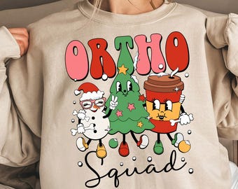 Ortho Squad Weihnachts-Shirt, Ortho-Crew-Shirt, Orthopädie-Abteilung Shirt, Weihnachts-Krankenschwester-Shirt, Geschenk für Orthopädie, Feiertags-Krankenschwester-Shirt