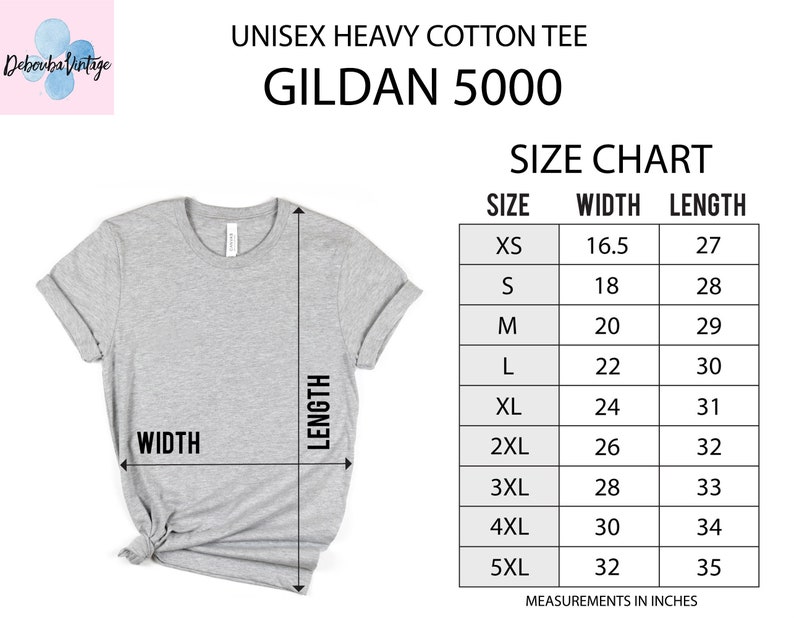 May include: A light gray unisex heavy cotton tee shirt, Gildan 5000, with a size chart showing measurements in inches. The shirt is displayed with width and length measurements. The size chart includes sizes XS to 5XL.