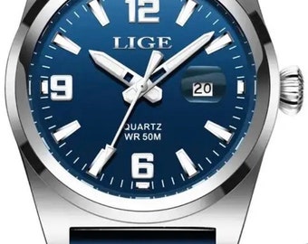 Montre cadran bleu bracelet caoutchouc bleu