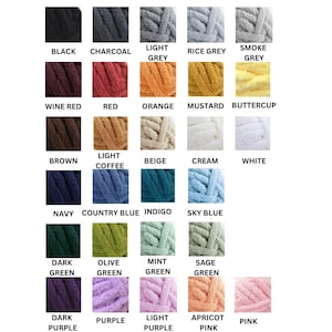 May include: A color chart featuring twenty-nine swatches of thick, plush yarn in various shades including black, charcoal, grey, wine red, red, orange, mustard, buttercup, brown, light coffee, beige, cream, white, navy, blue, indigo, sky blue, green, and pink.