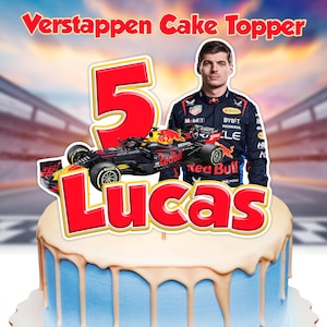 May include: A red, white, and blue cake topper featuring a Formula 1 race car, a driver, and the number 5. The driver is wearing a red and blue racing suit and a white helmet. The cake topper also includes the name "Lucas" in red and yellow letters.