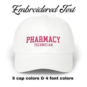 May include: White baseball cap with the text "PHARMACY TECHNICIAN" embroidered in pink.