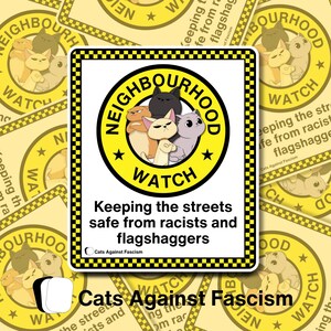 May include: A sticker with a yellow border and the words "NEIGHBOURHOOD WATCH" in a circle, featuring cartoon cats. The text "Keeping the streets safe from racists and flagshaggers" is below. The sticker is from "Cats Against Fascism".