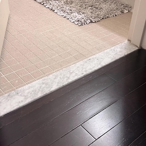 White Carrara Marble Door Saddle For Floor Transitions | Doble Bevel, Single Hollywood, and Double Hollywood Bevel Options