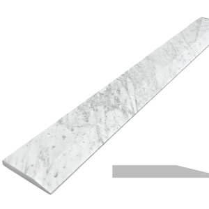 May include: A long, rectangular piece of white marble with gray veining. The marble has a beveled edge on one side. A gray, rectangular outline of the marble's profile is shown below the marble.