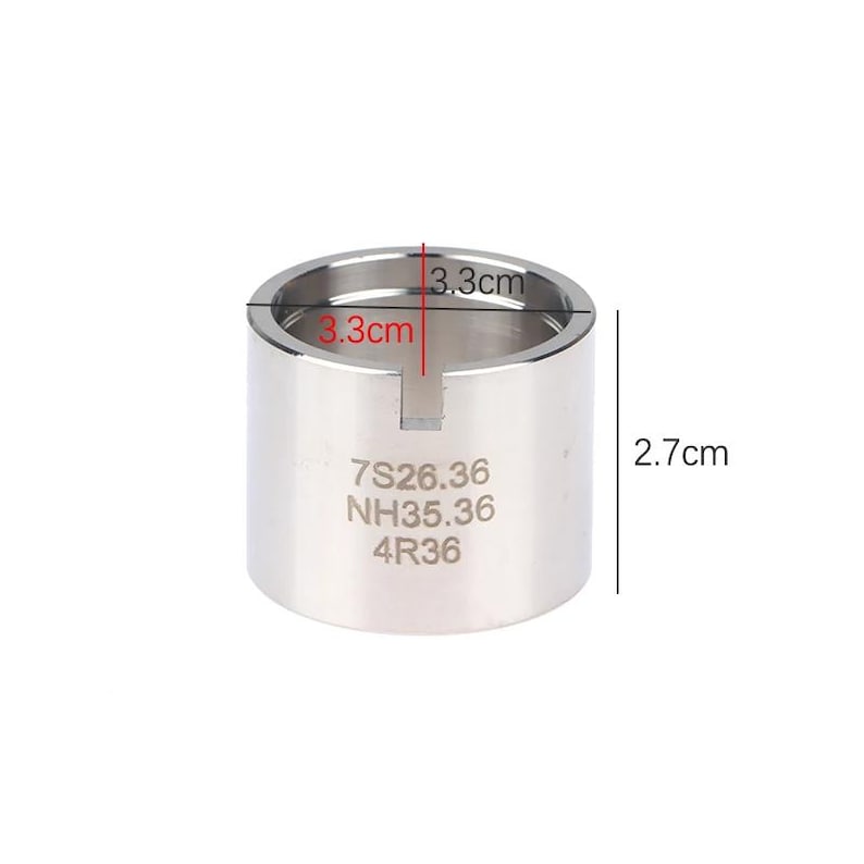 K&ouml;nnte beinhalten: Ein zylindrisches, silberfarbenes Metallwerkzeug mit einem Schlitz an einer Seite. Das Werkzeug hat einen Durchmesser von 3,3 cm und eine H&ouml;he von 2,7 cm. Der Text "7S26.36 NH35.36 4R36" ist auf der Seite eingraviert.