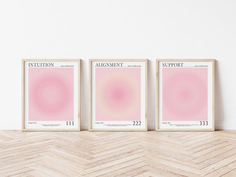 May include: Three framed prints with pink and white gradient backgrounds. The prints are titled "INTUITION", "ALIGNMENT", and "SUPPORT" with the text "Angel No." and a number below each title.