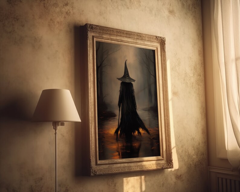 May include: A framed painting of a witch wearing a black pointed hat and robe, walking through a dark forest. The witch is holding a staff and the forest is filled with fog.