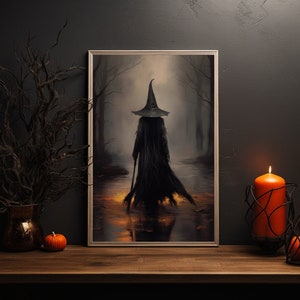 May include: A framed painting of a witch wearing a black pointed hat and robe, walking through a dark forest. The witch is holding a staff and the forest is lit by a warm glow.