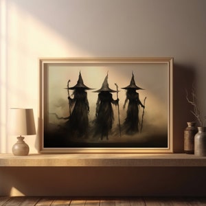 May include: A framed print of a fantasy illustration depicting three cloaked figures wearing pointed hats and holding staffs. The figures are walking through a misty, ethereal landscape.