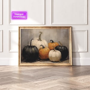May include: A painting of six pumpkins in various shades of white, black, and orange. The pumpkins are arranged in a still life composition on a textured background.