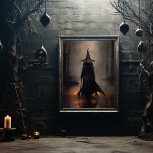 May include: A framed painting of a witch in a black cloak and pointed hat walking through a dark forest. The painting is hanging on a brick wall with two bare branches on either side.