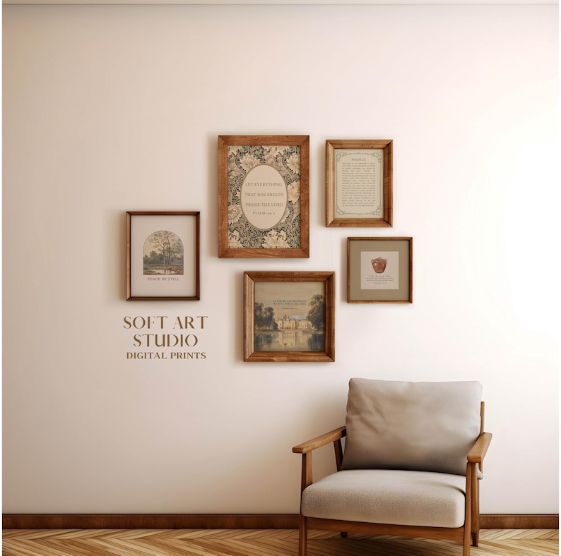 May include: A collection of five framed art prints in various sizes and styles, displayed on a light-colored wall. The frames are a warm brown, and the prints feature botanical and landscape imagery, along with text. The text "SOFT ART STUDIO DIGITAL PRINTS" is visible.