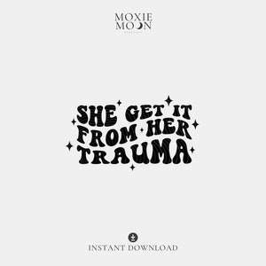 May include: Black and white graphic design with the text "She Get It From Her Trauma" in a retro font style with stars around the text.