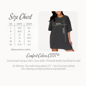 May include: A dark gray oversized t-shirt with a size chart. The chart lists sizes S to 3XL with width and length measurements in inches. The shirt is made of garment-dyed ring spun fabric.