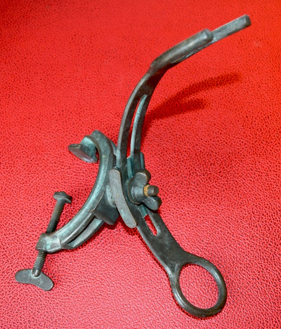 vintage bronze fishing rod holder with side mount