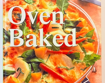 May include: A cookbook titled Oven Baked with the subtitle Over 120 delicious recipes. The cover features a photograph of a casserole dish filled with roasted vegetables including orange squash, red peppers, and green leafy herbs.