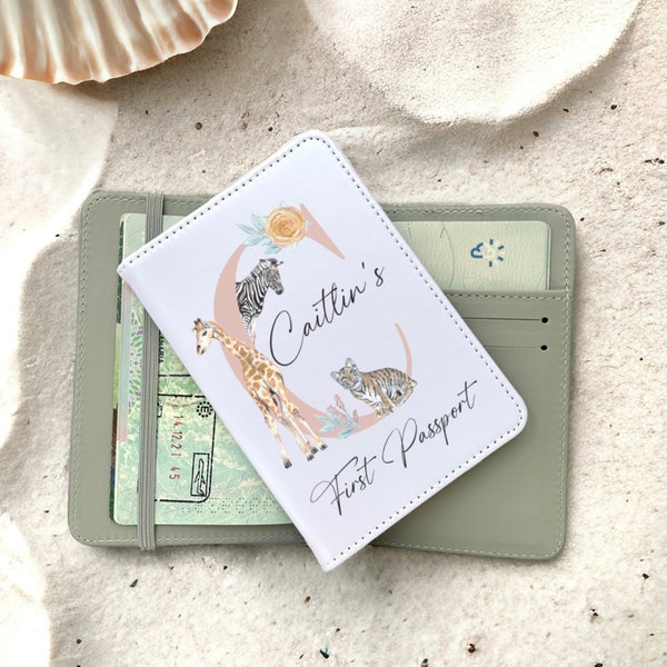 BABY SHOWER GIFTS - personalised passport holder in safari animal design. This makes a unique new baby gift. Matching luggage tag available.