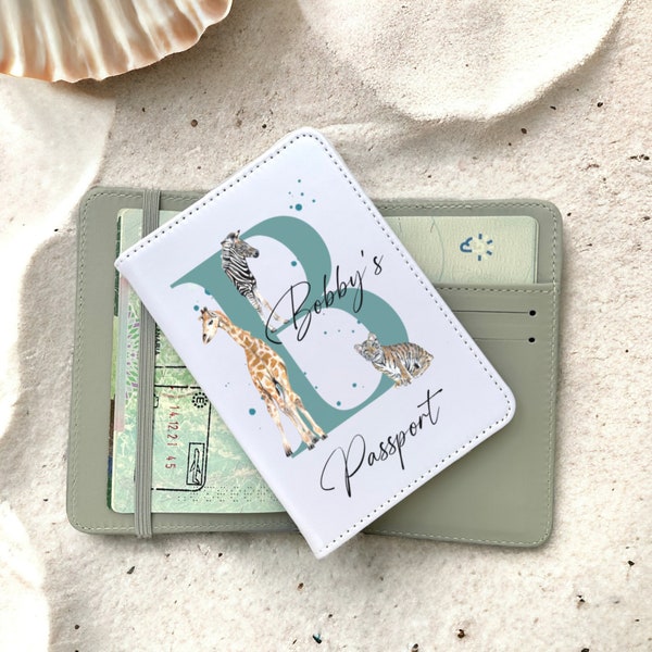 Boys personalised passport cover in a safari animal design. Kids and baby passport holders. matching luggage tags available. unique gifts.