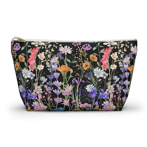 Bolsa para accesorios con diseño floral: Neceser de poliéster con tirador dorado