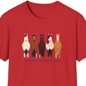 May include: Red t-shirt with a line of five cartoon horses in a conga line. The text "This is the only CONGA I want" is printed below the horses.