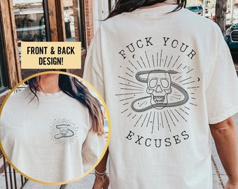 May include: A white t-shirt with a black skull and snake design on the back. The text "FUCK YOUR EXCUSES" is printed below the design.