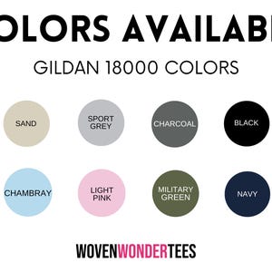 May include: Image displaying a color chart with the text "COLORS AVAILABLE" and "GILDAN 18000 COLORS." The chart features eight color swatches: Sand, Sport Grey, Charcoal, Black, Chambray, Light Pink, Military Green, and Navy. The brand name "WOVENWONDERTEES" is at the bottom.