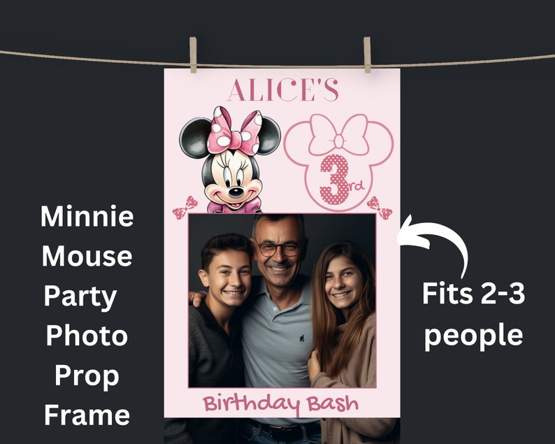 May include: Pink Minnie Mouse themed photo booth prop with a cut-out for a picture. The prop features Minnie Mouse with a pink bow and the text "ALICE'S Birthday Bash". It also has a pink bow with the number "3rd" in the corner. The text "Fits 2-3 people" is written on the right side of the image.