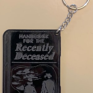 Handbook for the recently deceased - Black acrylic bag accessory