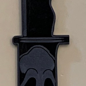 Cuchillo antifaz Yell - Accesorio bolsa de acrílico negro