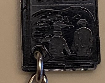 baby Handbook for the recently deceased - Black acrylic keychain