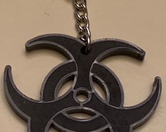 biohazard symbol - Black acrylic keychain